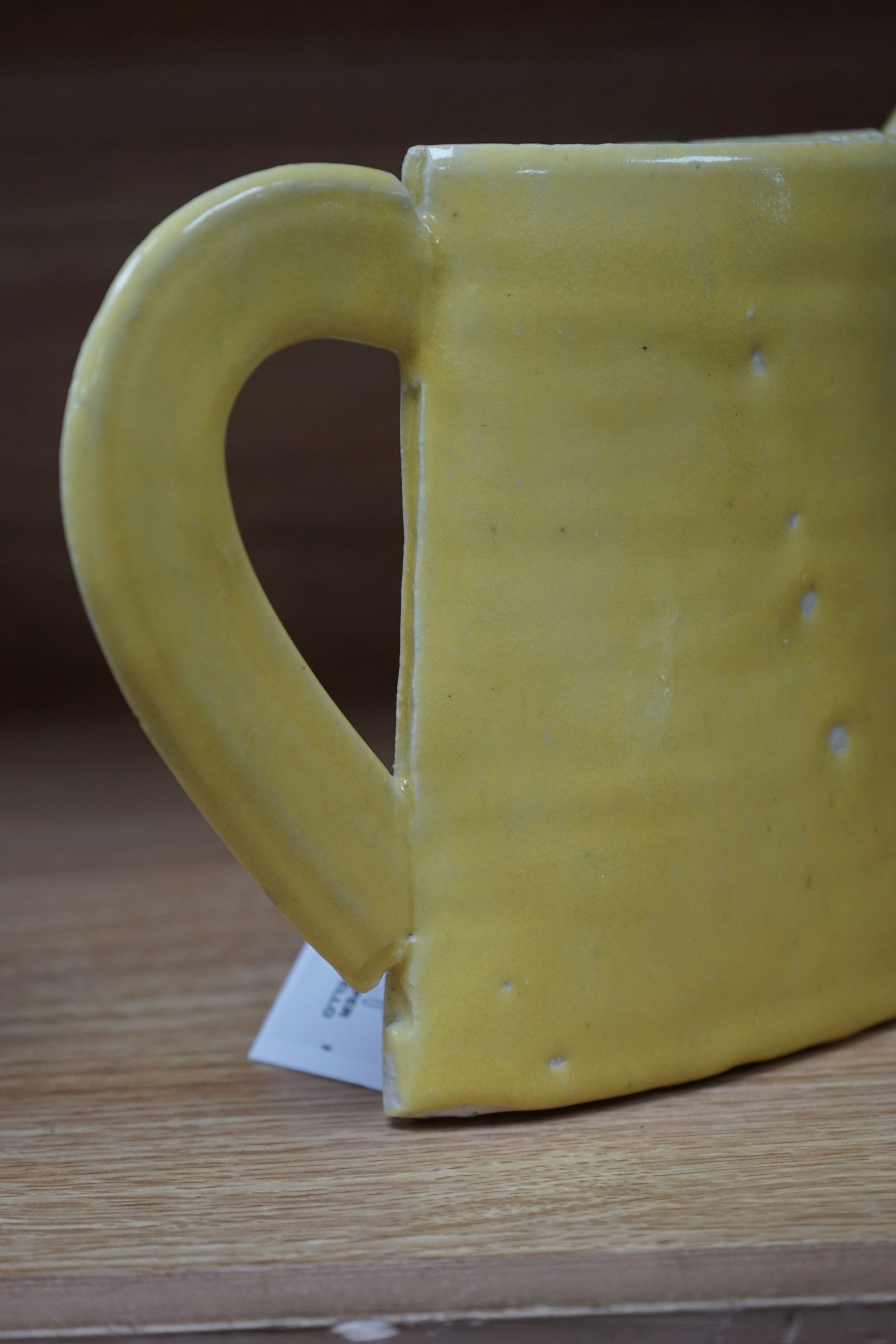 Emmanuel Cooper (1938-2012), a yellow glazed jug 20cm